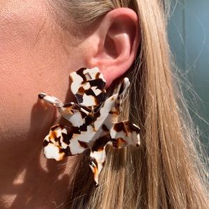 Clip on acetate lily flower earrings